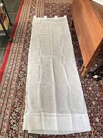 Panel laid flat showing full length, tab tops visible