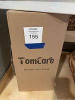 Boxed TomCare garden hose stand