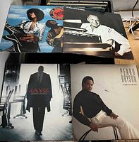 Selection of album covers including Jay-Z, Peabo Bryson, Frank Sinatra, jazz and pop titles