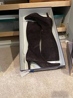 Pair of dark brown suede over-the-knee boots in original Stuart Weitzman box