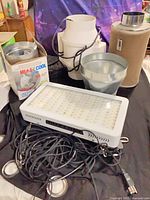 Group shot showing LED grow light, carbon filter, inline fan, duct fittings and cords