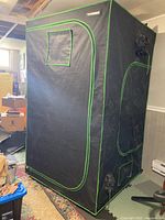 Front view of VIVOSUN grow tent showing window and door outline