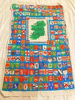 Full view of tea towel showing shields pattern