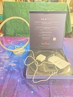 Lamp, base, power adapter and manual in open box