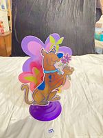 Front view of Scooby-Doo night light showing character and floral acrylic design on purple base