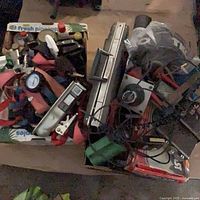 overview of two boxes with air horns, electronics, straps, tools
