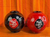 Front view of both vases showing colors and inlay