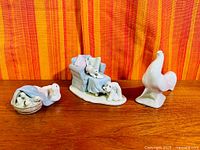 All three porcelain figurines together