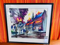 Full view of framed watercolour street scene