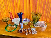 overall view of all art glass pieces and crystal items