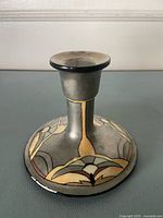 Side view of candlestick showing Art Deco design