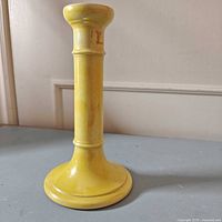 Full view of Moorcroft yellow candlestick front