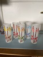 Front view of six frosted bamboo tumblers
