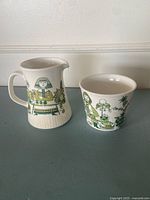 Creamer and sugar bowl front view