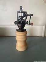 Full view of wood base and metal mechanism