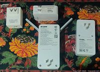All four adapters: TP-Link TL-PA610, D-Link DHP-P610AV, D-Link DHP-W610AV with antennas, TP-Link TL-WR700N