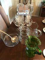 Group shot of all acrylic drinkware, pitchers, punch bowl and ladle