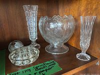 Full set on shelf showing bowl, vases, flower frog, paperweight