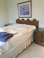 Full view of queen bedframe with headboard and both nightstands