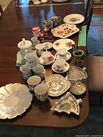 overview of all Christmas serveware and drinkware laid out on table