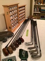 Overall view of clubs, display racks, golf balls and accessories