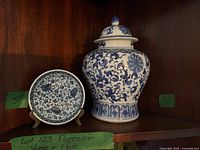 Jar and plate side by side on shelf