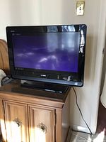 Front view of Sony 26-inch Bravia TV powered on