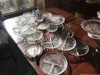 Overview of entire pressed glass collection on table