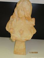 Full view of alabaster bust on pedestal base