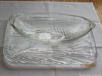 Tray and banana dish together on cloth background