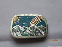 Front of sterling silver abalone inlay belt buckle