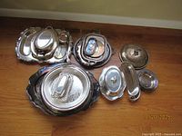 All silver-plate items grouped together