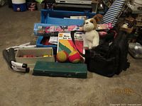 Group shot of entire lot showing games, toys, books, kite, plush, bags