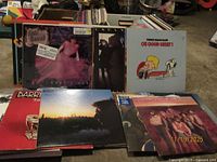 Front view of assorted albums showing Linda Ronstadt, Vince Guaraldi and others