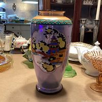 Front view showing scenic panel and lustre glaze