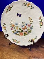 Front view of Aynsley Cottage Garden plate showing floral and butterfly design