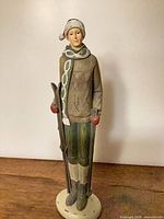 Full view of skier figurine