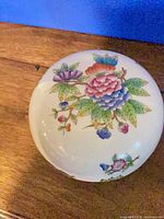 Top view of lidded bonbonniere showing floral pattern