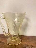 Full side view of yellow Florentine Poppy footed pitcher