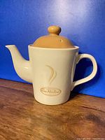 Full view of Tim Hortons ceramic teapot showing body, handle and spout