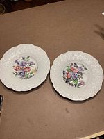 Pair of bowls top view showing pattern and relief rim