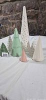 All seven ceramic trees grouped to show sizes and colors