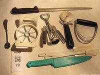 All nine kitchen utensils laid out