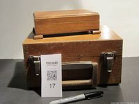 Both wood boxes together for scale and context