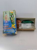 Box front with bodies visible inside