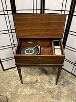 Lid open view showing Garrard turntable and control panel