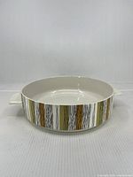 Top-angled view of the round casserole showing interior and exterior pattern