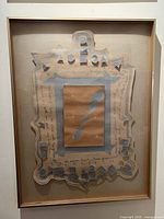 Full view of framed collage artwork