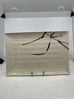 Front view of rectangular cream tray with brown design