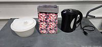 Overall lot showing kettle, lunch bag, salad spinner